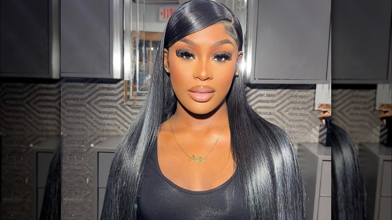 long sleek hair swooped over forehead