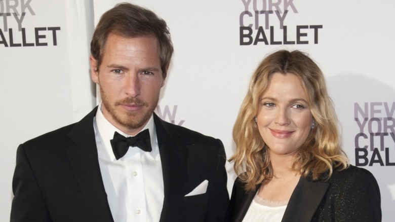 Will Kopelman on the red carpet with Drew Barrymore in 2012, both wearing black blazers