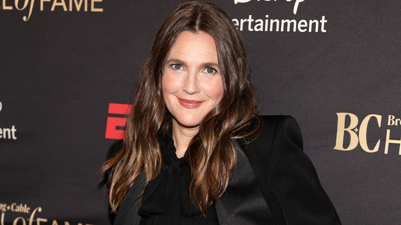 Drew Barrymore smiles on the red carpet in 2025