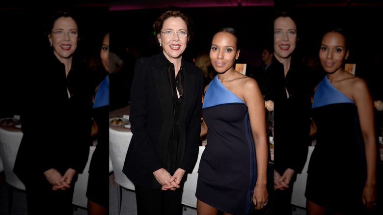 Annette Bening wearing a red lipstick and thin rimmed glasses next to Kerry Washington