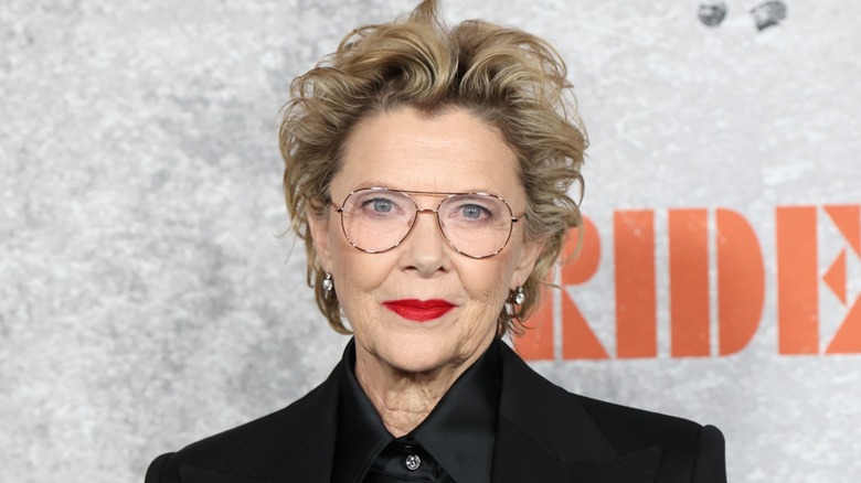 Annette Bening wearing red lipstick at a movie premiere in 2026