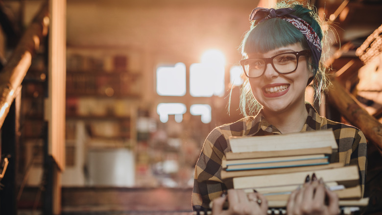 Woman holding books