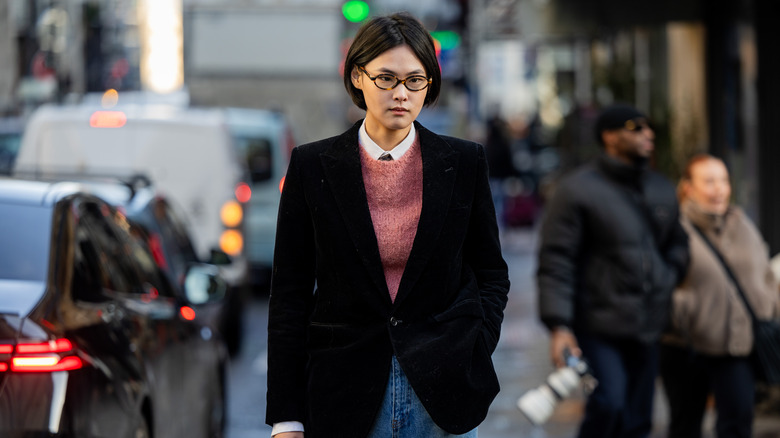 A woman wearing a blazer 