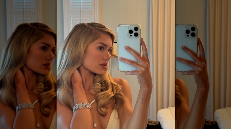 Michelle Randolph posing for a mirror selfie