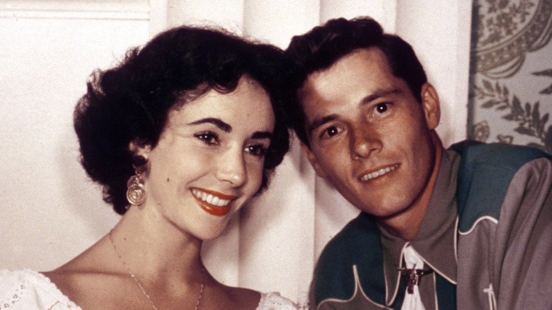 Elizabeth Taylor and Conrad Hilton smiling