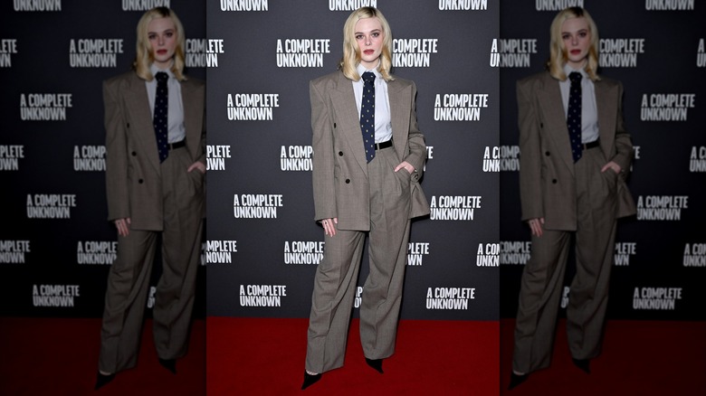 Elle Fanning in a suit and tie