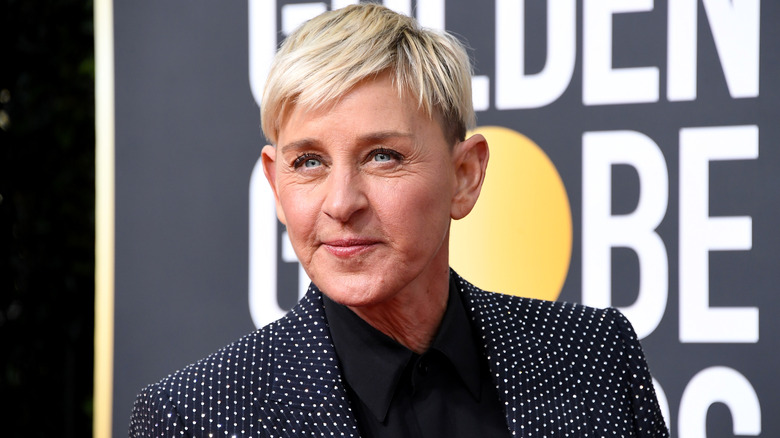 Ellen DeGeneres posing in a polka-dotted suit at the 2020 Golden Globe Awards