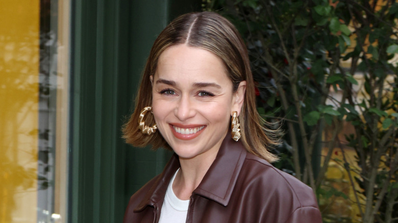 Emilia Clarke walking on the street