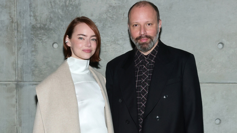 Emma Stone poses with Yorgos Lanthimos at the Louis Vuitton and W Magazine's Intimate Awards Season Dinner