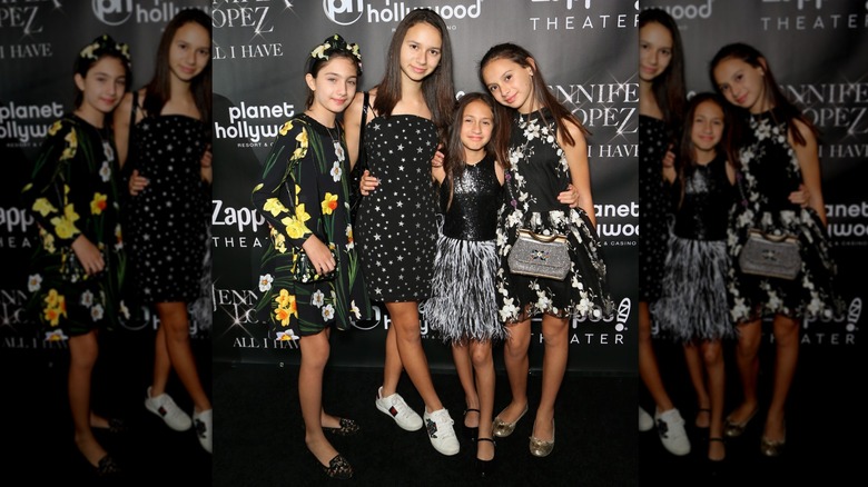 Emme Muniz on the red carpet with friends
