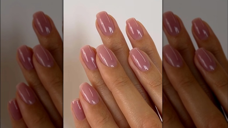 A close-up of a woman wearing Blush BB Cream nail polish