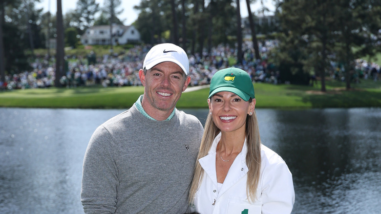 Rory McIlroy and wife Erica Stoll pose at the 2026 Masters Tournament