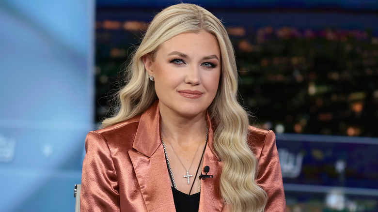 Erika Kirk on Fox News in a bronze blazer and long blonde hair