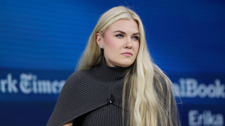 CEO and Chair of the Board of Turning Point USA Erika Kirk sits silently onstage