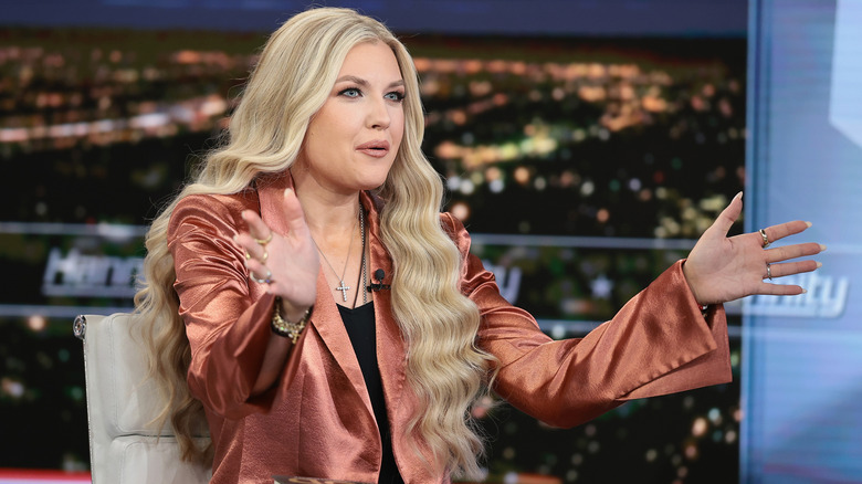 Erika Kirk on Fox News in a bronze blazer