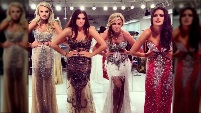 Erika Kirk and friends posing in embellished dresses