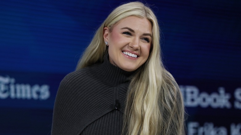 Erika Kirk smiling on stage