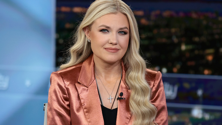 Erika Kirk on Fox News in a bronze blazer and long blonde hair