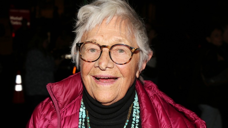 Estelle Parsons wearing glasses and a pink coat at the opening of Little Bear Ridge Road in 2025