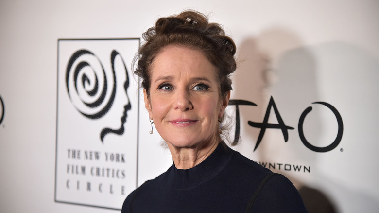 Debra Winger smiles on the red carpet in 2019