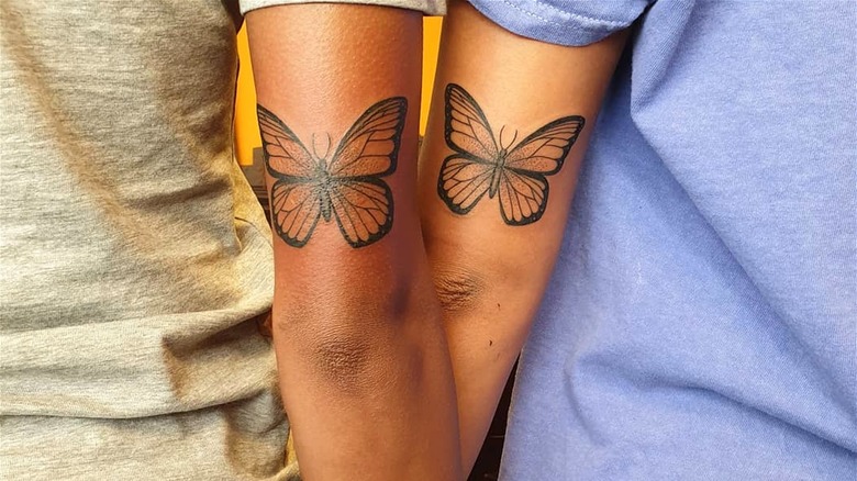 Matching butterfly tattoo