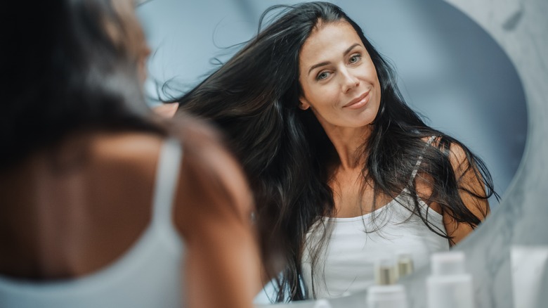 Woman touching her hair 