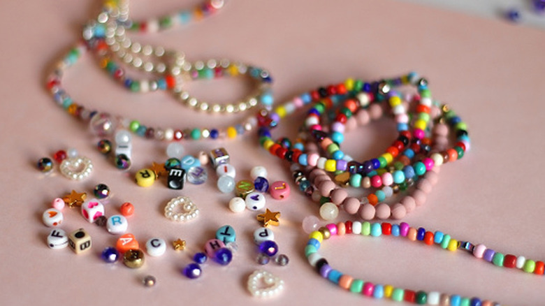 Necklaces and friendship bracelets with colorful beads