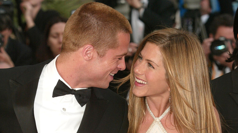Brad Pitt and wife actress Jennifer Aniston attend the World Premiere of the epic movie "Troy" at Le Palais de Festival on May 13, 2004
