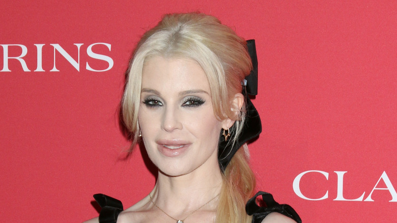 Kelly Osbourne smiling