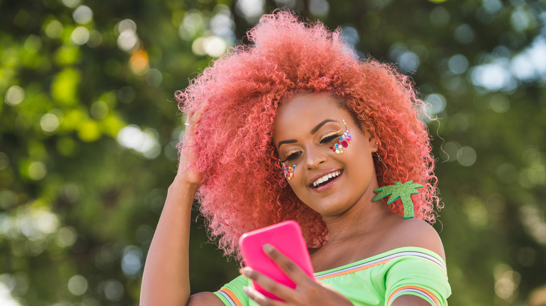 woman taking selfie