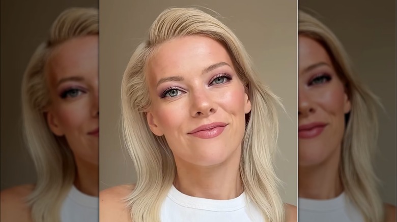 A woman doing a makeup tutorial on hooded eyes on Instagram