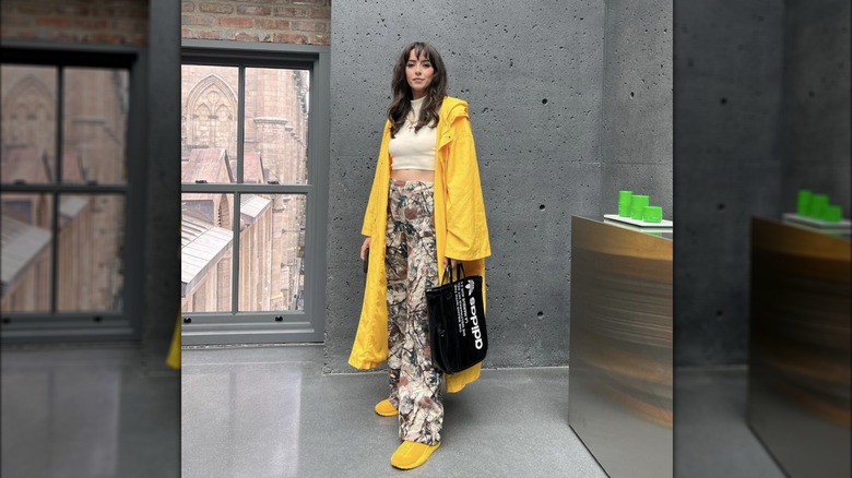 woman wearing a yellow jacket 