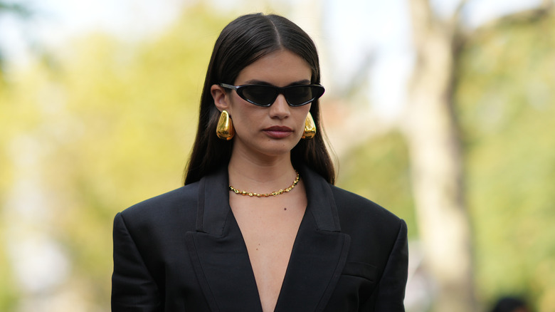 Woman in big gold earrings 