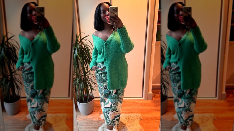 A woman on Instagram in a pencil skirt and green sweater