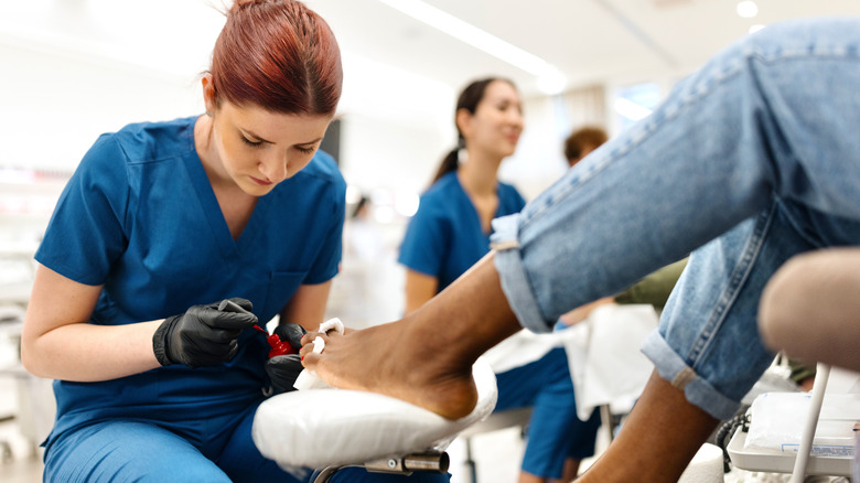 woman getting a dry pedicure