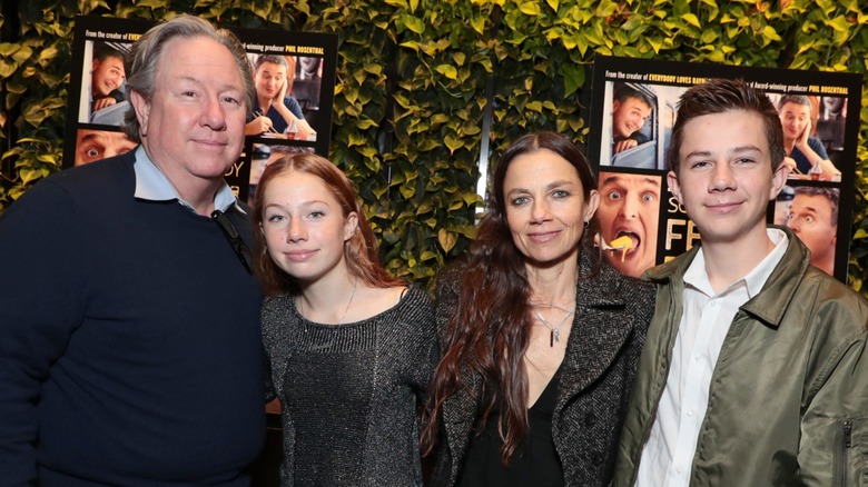 Justine Bateman and her husband Mark Fluent posing for a photo with their children