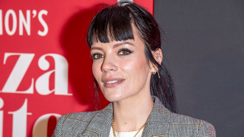 Lily Allen smiles on the red carpet in 2022