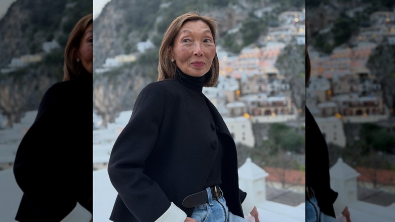 Fashion influencer Gym Tan poses for a photo while on vacation in Italy