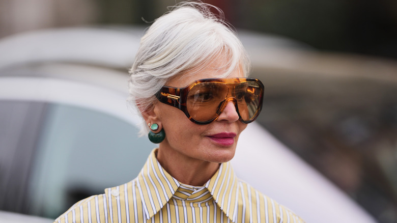 Fashion influencer Grece Ghanem poses in front of the Hermes fashion show during Paris Fashion Week