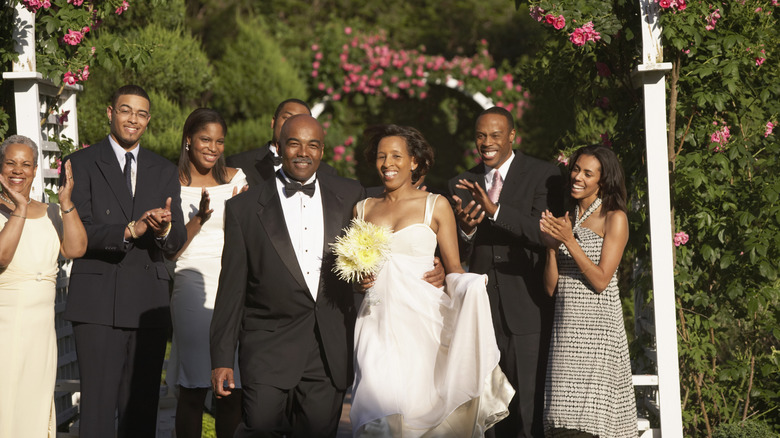 A family bridal portrait outside