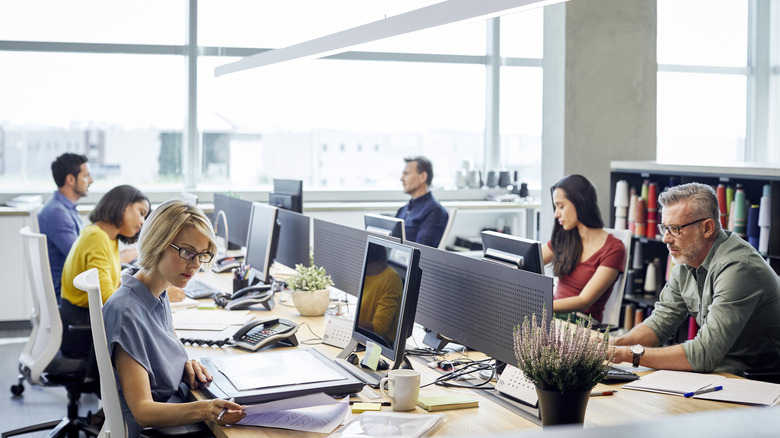 People working in a shared workspace
