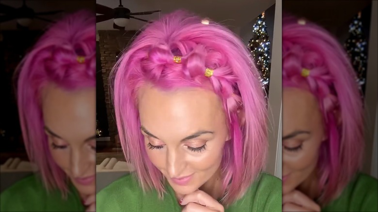 A woman with hair bows in her bob