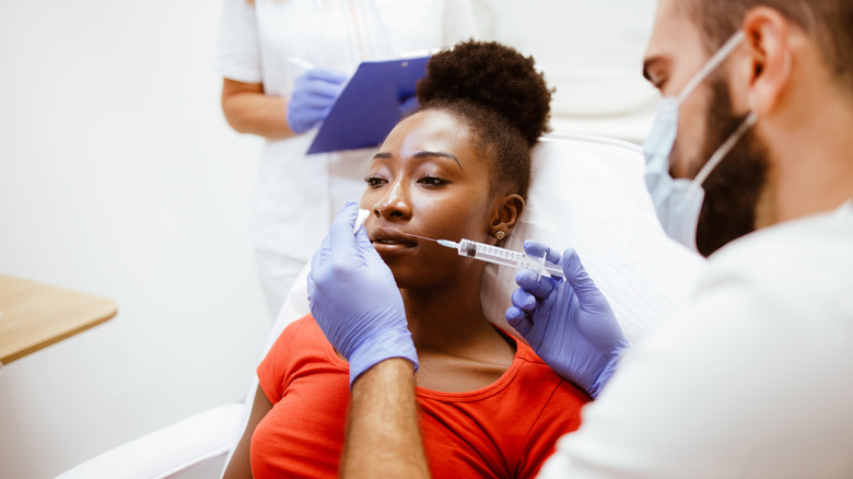 Woman taking plastic surgery