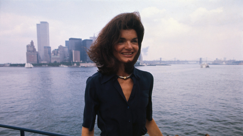Jackie Kennedy poses outside