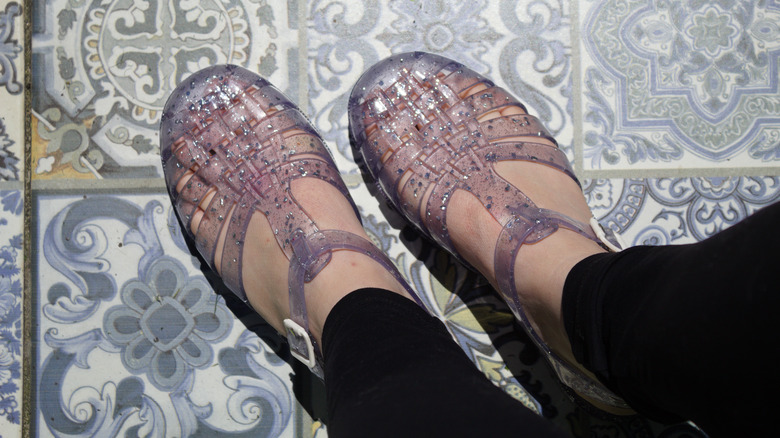 woman in jelly sandals