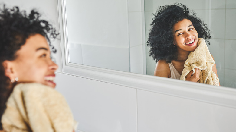 Woman holding towel