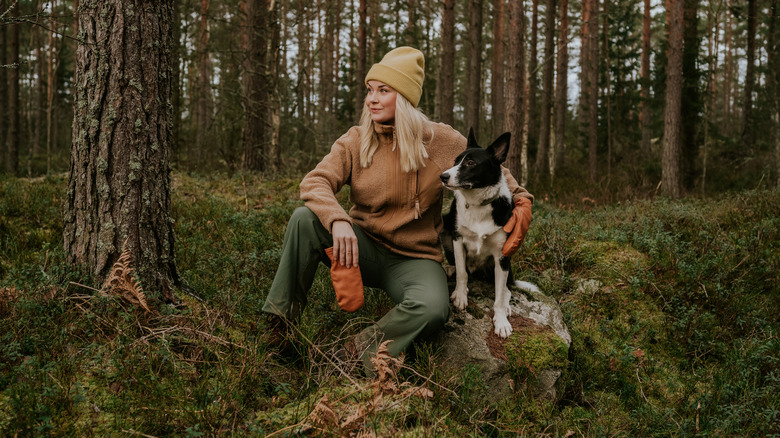 In forest with dog