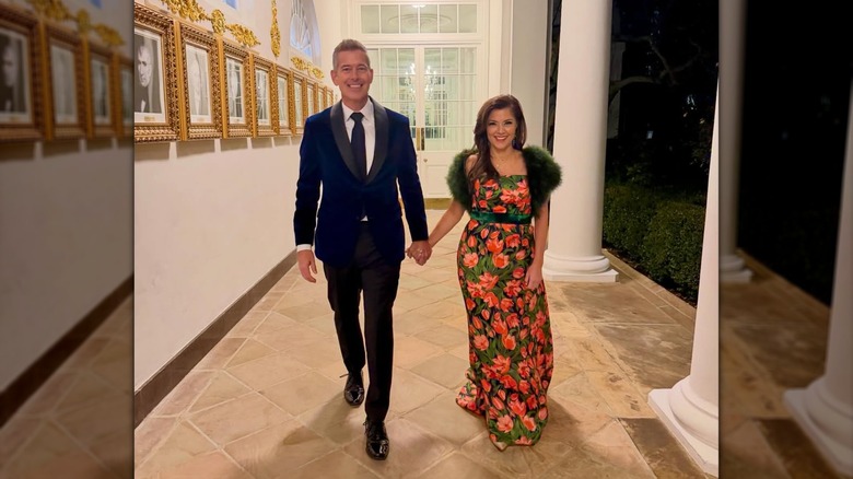Sean Duffy and Rachel Campos-Duffy walking together while holding hands