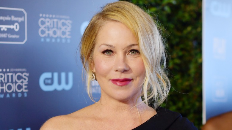 Christina Applegate posing with a slight smile on the red carpet