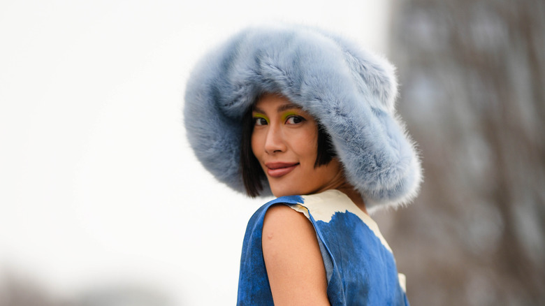 Woman in a furry hat 